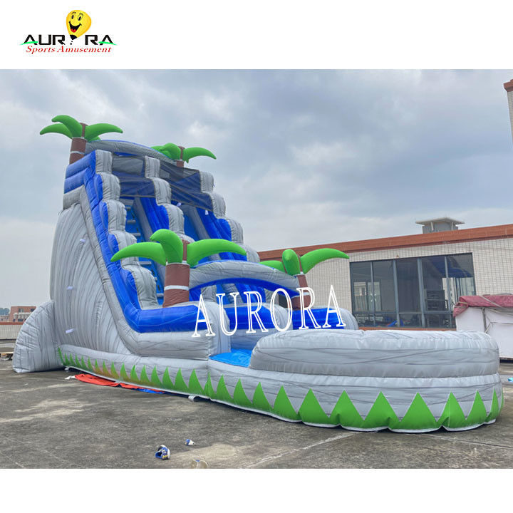 Combo de toboganes inflables al aire libre azul y gris con casa de salto para niños