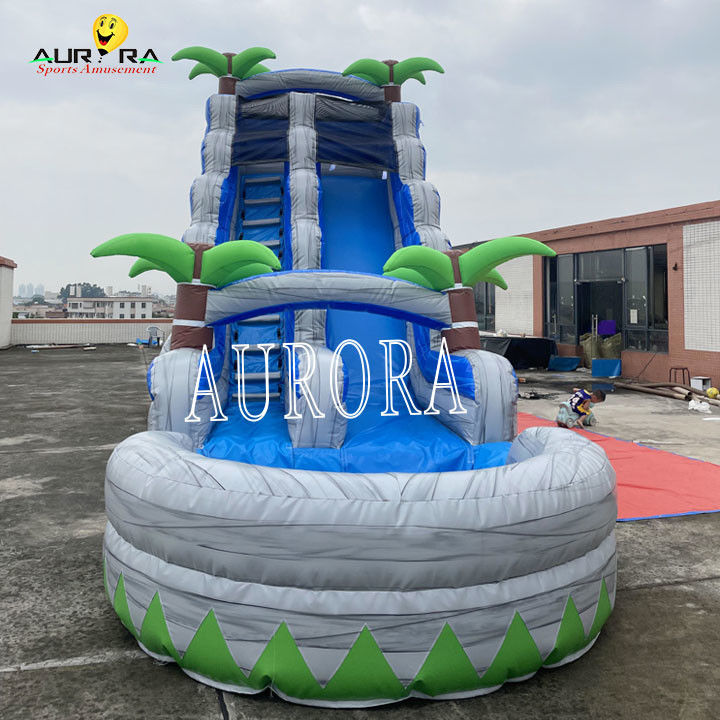 Combo de toboganes inflables al aire libre azul y gris con casa de salto para niños